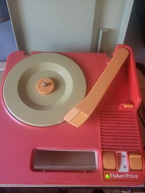 Fisher-Price Red and Cream Portable Record Player with Orange Arm